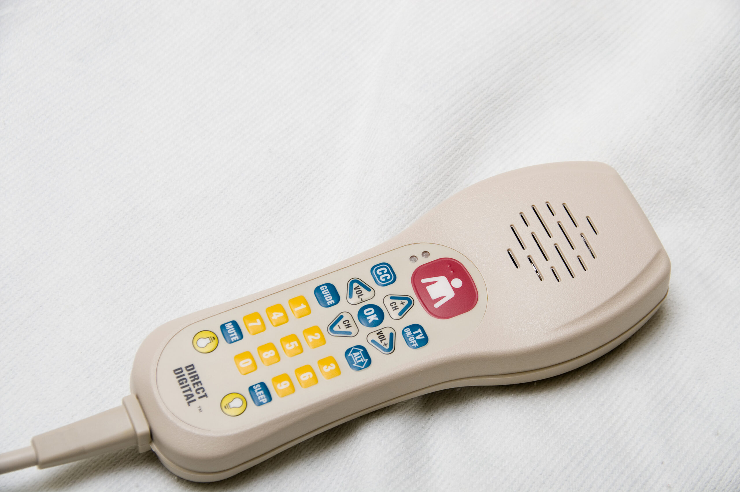 A,Tv,Remote,Control,With,A,Nurse,Call,Button.